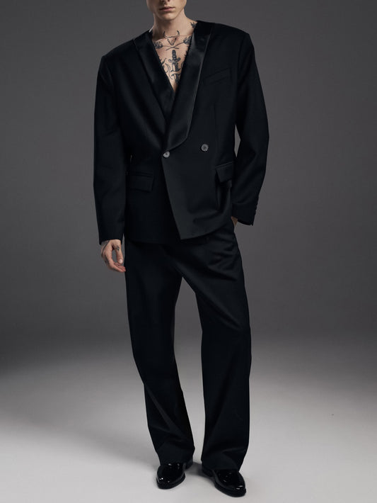 Черный асимметричный блейзер с широкими лацканами